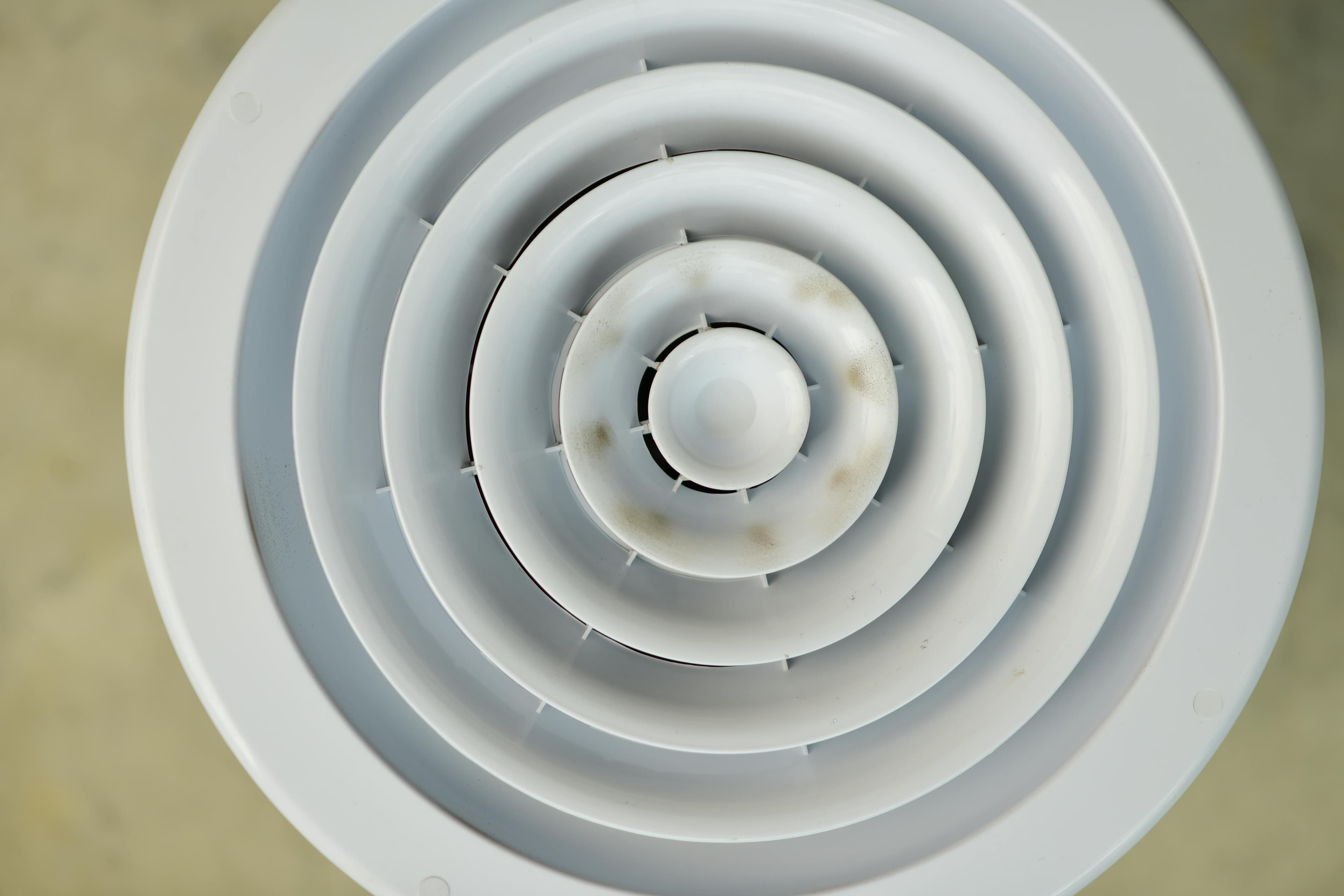 Small-diameter duct routing through wall cavity