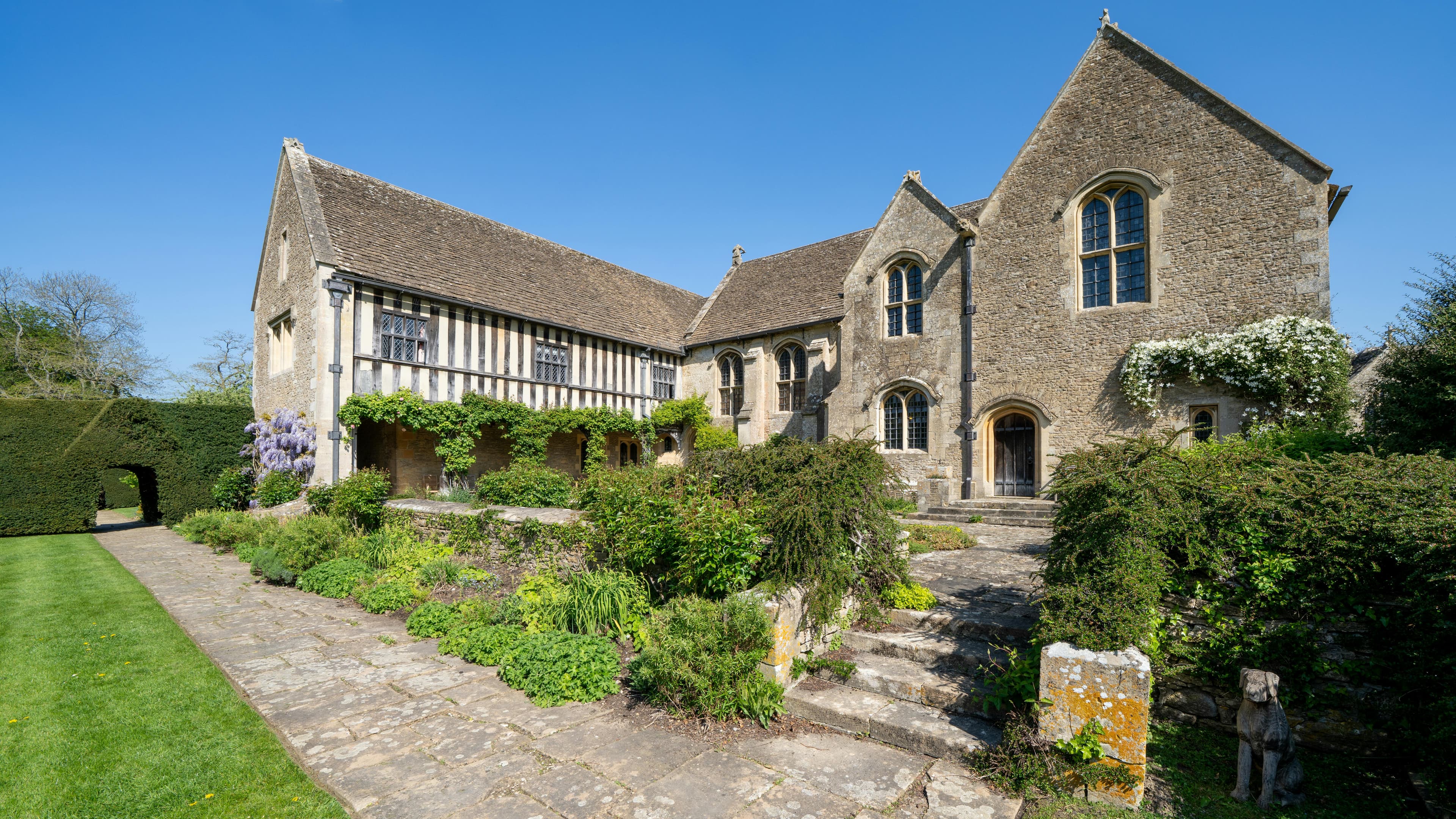 Stone manor house exterior at dusk