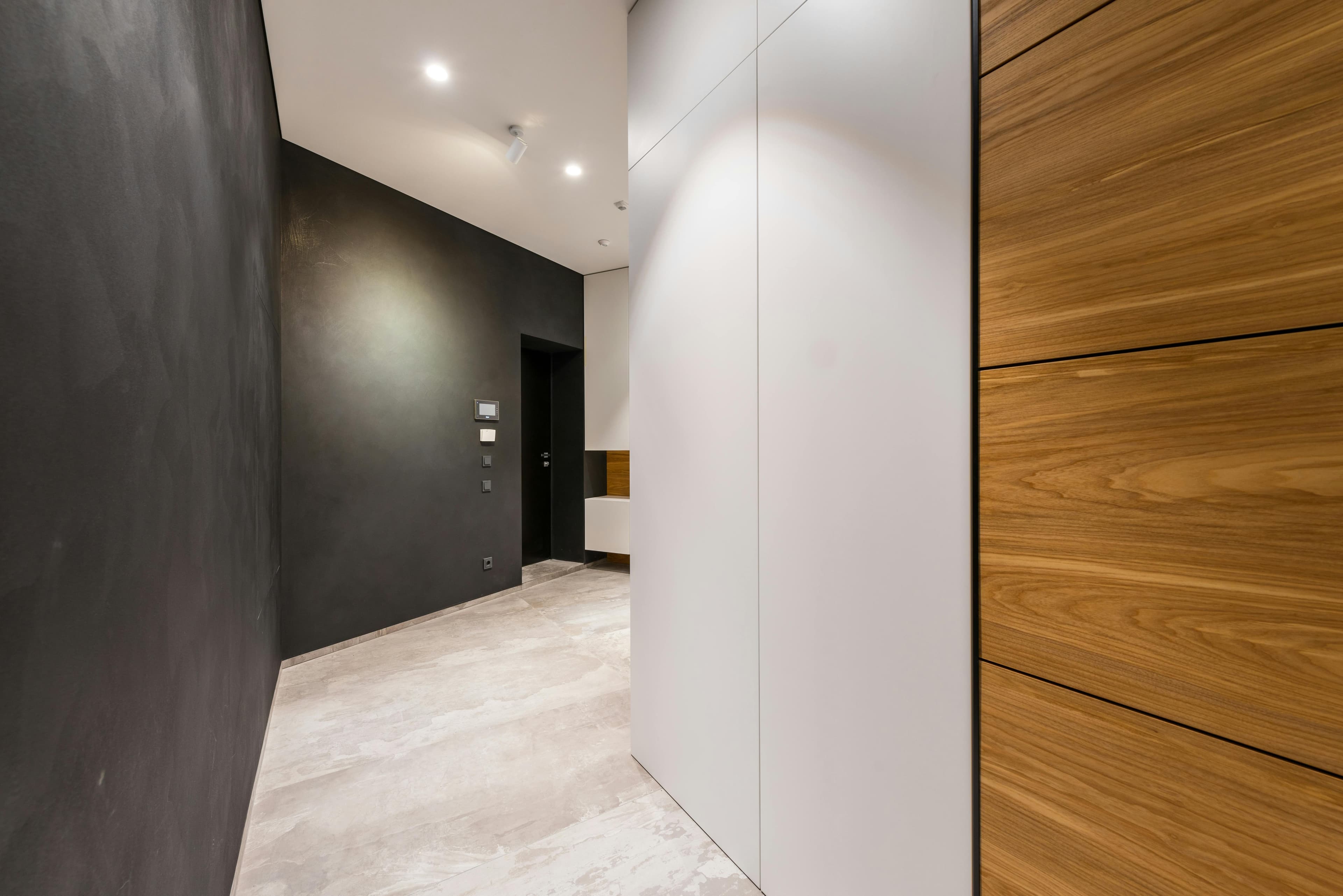 Flush wall-panel unit in restored plaster